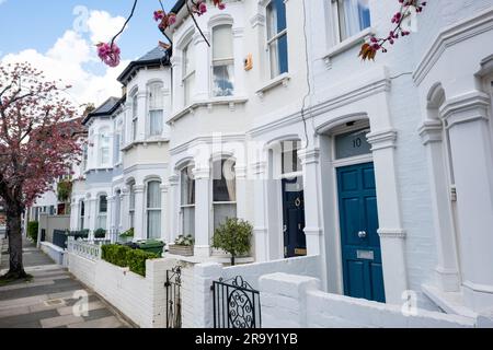 LONDON- APRIL, 2023: Street of terraced houses off New Kings Road in Parsons Green area of SW6 south west London Stock Photo