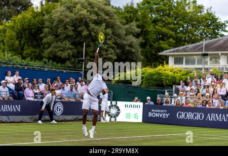 Frances Tiafoe in action against Novak Djokovic on day three of the