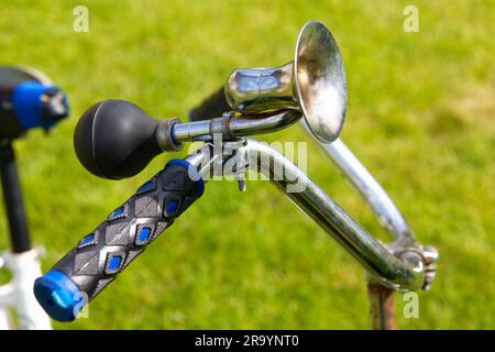 Vintage horn on handlebar of an old bicycle Stock Photo