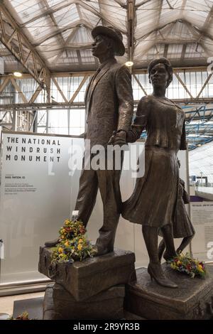 Basil Watson's The National Windrush Monument on the concourse at Waterloo Station, Lambeth, London, SE1, England, U.K. Stock Photo