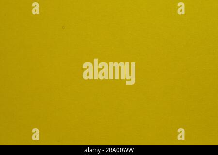 Yellow  paper texture background or cardboard surface from a paper. For the designs decoration and nature background concept Stock Photo