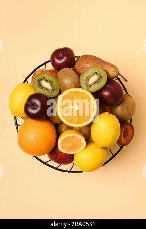 An overhead view of a black metal basket full of fruit Stock Photo