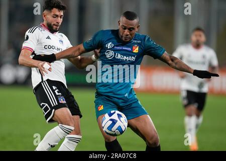 Angelo Rodriguez of Colombia's Deportivo Pereira, left, heads the ball as  Murilo of Brazil's Palmeiras pressures him during a Copa Libertadores  quarterfinal second leg soccer match at Allianz Parque stadium in Sao