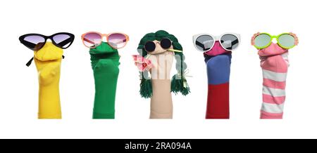 Many colorful sock puppets on white background, collage design Stock Photo