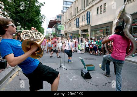 Toronto, Ontario / Canada - Aug 25, 2013: Street performers entertaining the crowd at Buskerfest in Toronto Stock Photo
