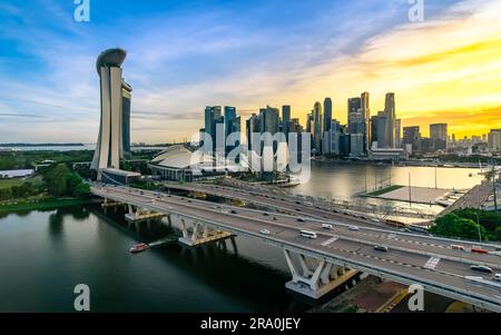 Aerial view of sunset dusk at Singapore Marina Bay city skyline. Stock Photo