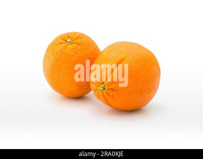 Two nice juicy natural oranges isolated on white background Stock Photo