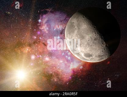 Fantasy composition with the moon in a starry sky. The planet Saturn and the Andromeda galaxy appear in the distance. Elements of this image Stock Photo