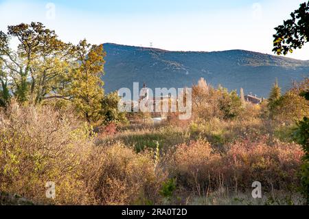 Eglise Saint Christophe (Saint Christophe Church), in Sollies-Toucas, Provence, France. In the background appears the mountain named Pilon Stock Photo