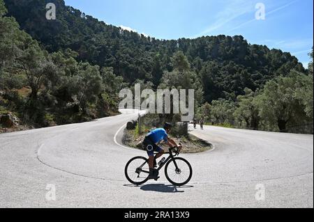 Road cyclist on the Coll de Soller in the Tramuntana Mountains, Majorca, Spain Stock Photo