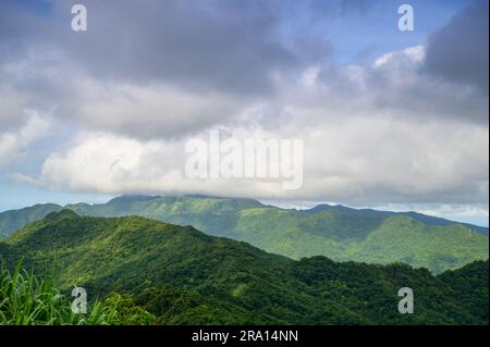 Fast moving clouds over the mountain tops. Jiufen at dusk. Ruifang District, New Taipei City, Taiwan Stock Photo