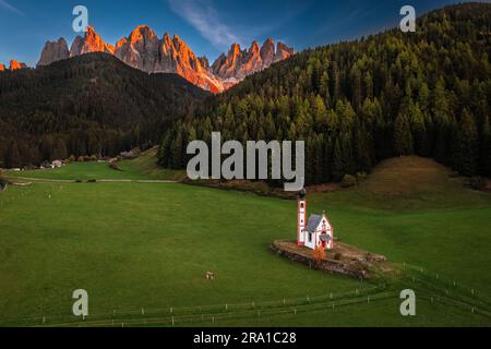 Val Di Funes, Dolomites, Italy - Aerial view of the beautiful St. Johann Church (Chiesetta di San Giovanni in Ranui) at South Tyrol with the Italian D Stock Photo
