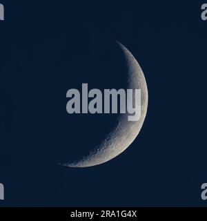 crescent moon on dark background Stock Photo