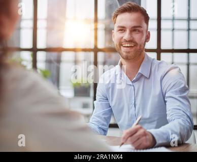 Handsome bearded man in a modern office Stock Photo