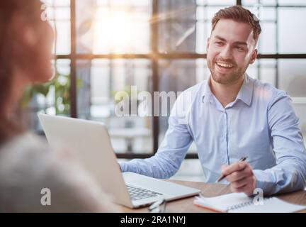 Handsome bearded man in a modern office Stock Photo