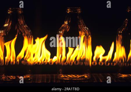 Glass bottles on assembly line in Mexicali, Mexico. Stock Photo