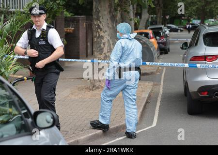 30/06/2023. London, UK.  The scene at Elthorne Road, Islington, north London where A boy, believed to be aged 15 and a man aged 23 were fatality stabbed yesterday evening (Thurs). A double murder investigation has been launched. Photo credit: Ben Cawthra/Sipa USA Stock Photo