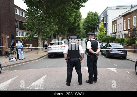 30/06/2023. London, UK.  The scene at Elthorne Road, Islington, north London where A boy, believed to be aged 15 and a man aged 23 were fatality stabbed yesterday evening (Thurs). A double murder investigation has been launched. Photo credit: Ben Cawthra/Sipa USA Stock Photo