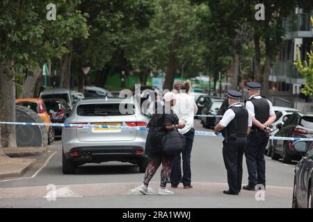 30/06/2023. London, UK.  The scene at Elthorne Road, Islington, north London where A boy, believed to be aged 15 and a man aged 23 were fatality stabbed yesterday evening (Thurs). A double murder investigation has been launched. Photo credit: Ben Cawthra/Sipa USA Stock Photo