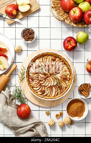 Apple pie. Apple tart with cinnamon, walnuts and pecan nuts, top view Stock Photo