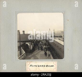 Two snapshot views of Butterley, an old crowded railway station platform in the 1920s, showing people waiting to traval to a tennis match. Advertising signs, fashion, pages of an old photo album.  Very atmospheric. Stock Photo