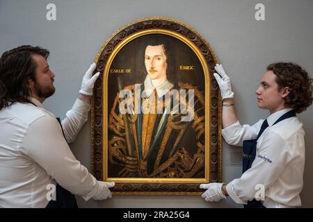 London, UK.  30 June 2023. Technicians present “Portrait of Robert Devereux, 2nd Earl of Essex” by Sir William Segar (Est. £100,000 - 150,000) at a preview of highlights Sotheby’s Old Masters & 19th Century Paintings Summer Sales.  Works will be auctioned at Sotheby’s New Bond Street galleries 5 to 7 July.   Credit: Stephen Chung / Alamy Live News Stock Photo
