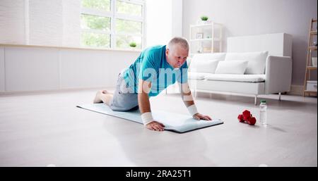 Funny Home Fitness Workout. Man Doing Sport Stock Photo