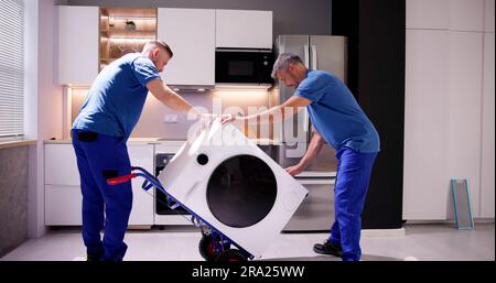 Washing Machine Appliance Delivery And Install. Move And Relocation Stock Photo