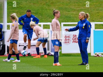 England manager Sarina Wiegman speaks to Keira Walsh during a training session at St. George's Park, Burton-on-Trent. Picture date: Friday June 30, 2023. Stock Photo