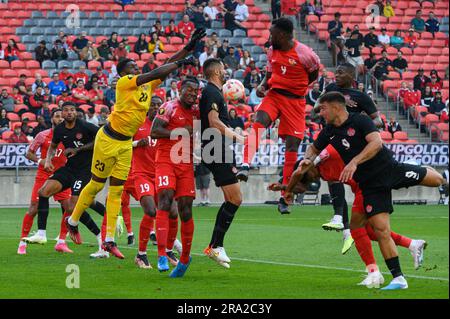 Toronto, ON, Canada - June 27, 2023: Players fight for the ball during the 2023 Concacaf Gold Cup match between national team of Canada and Guadeloupe Stock Photo