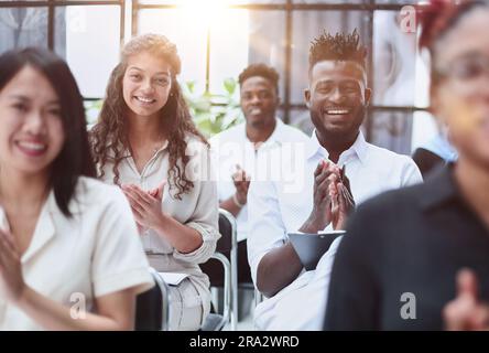 business training participants thank the speaker with applause Stock Photo