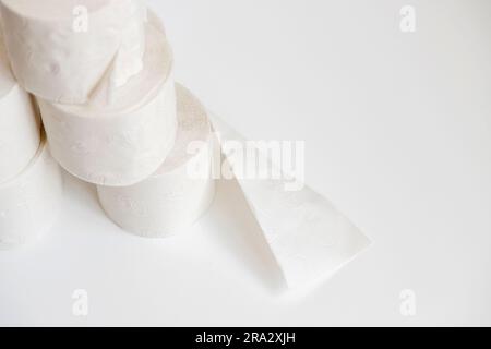 Recycled toilet paper rolls stacked on top of each other. Copy space. Concept of concern for sustainability, and environmental awareness in the use Stock Photo