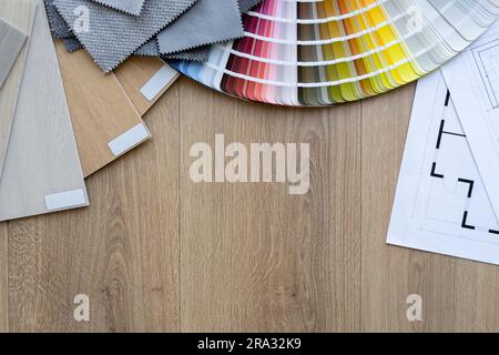 Color scheme palette guide catalog with colour swatches. Wooden flooring and furniture material samples. Blueprint projects. Flat lay with copy space. Stock Photo