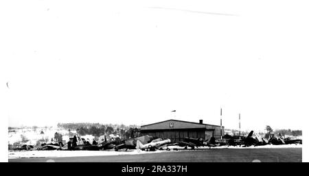 Aircraft at the Naval Air Station at Brunswick, Maine. Official U.S. Navy Photography Photo Lab - NAS - Brunswick, ME. Brun NO. 753-3-44. Date: 22 March 1944. Restricted.. 1944-03-22T00:00:00. Stock Photo