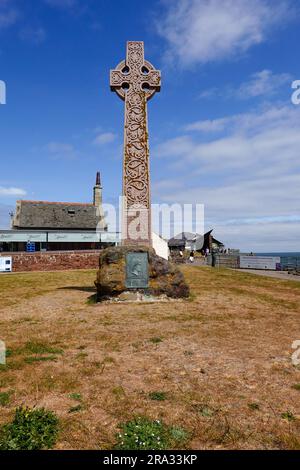 Carved stone celtic cross, in memory of Catherine Watson, who died 27th July 1889, rescuing a drowning boy near the harbour at North Berwick, Scotland Stock Photo