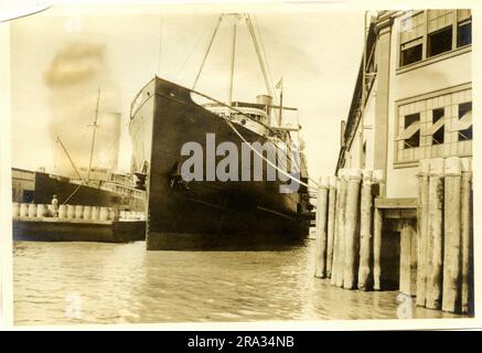 Photograph of the Port View of the SS City of St. Louis. Port View. Date: - July 19, 1918. Photograph Of: - S. S. City Of St Louis. Nationality: - American. Tonnage: - 5425. Captain: - L. Dalzell. Owners: - Ocean S. S. Co. Where From: - Boston, Mass. Destination: - Boston, Mass. Where Photographed: - Savannah, GA. Sixth Naval District. By Whom Photographed: - J. B. Dearborn. Date Photographed: - July 13th., 1918.. 1918-07-13T00:00:00. Stock Photo