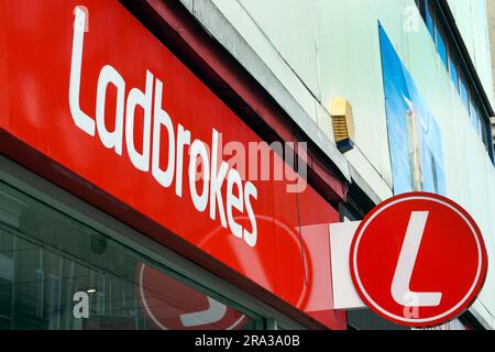Ladbrokes,  bookmakers sign, logo and copyrighted, outside a bookmakers shop premise, Glasgow. Stock Photo