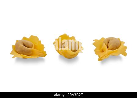 Tortellini di Valeggio: famous Italian handmade stuffed pasta from the province of Verona, also known as nodo d'amore (love knot). Isolated on white, Stock Photo