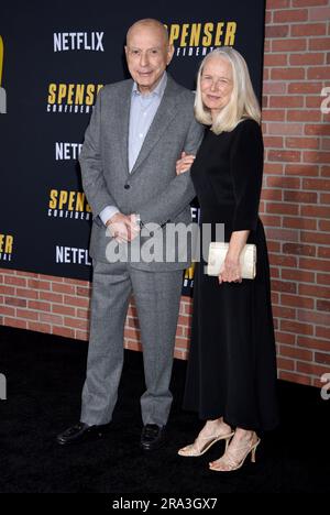 Westwood, USA. 30th June, 2023. Oscar winning actor Alan Arkin passed away at home in Carlsbad, California at the age of 89 on June 30, 2023. Alan Arkin and Suzanne Newlander Arkin at Netflix's 'Spenser Confidential' Los Angeles Premiere held at the Regency Village Theatre on February 27, 2020 in Westwood, CA. © Janet Gough/AFF-USA.COM Credit: AFF/Alamy Live News Stock Photo