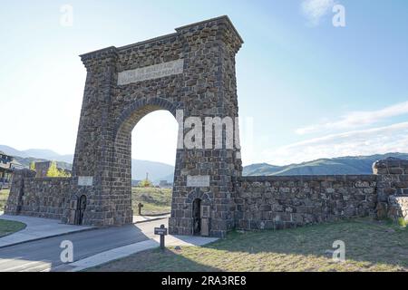 Gardiner, Montana, USA - May 17, 2023: Historic Roosevelt Arch for Yellowstone National Park Stock Photo
