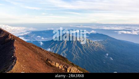 Batur caldera view from Agung mountain at Bali island, Indonesia. Beatiful balinese landscape. Stock Photo