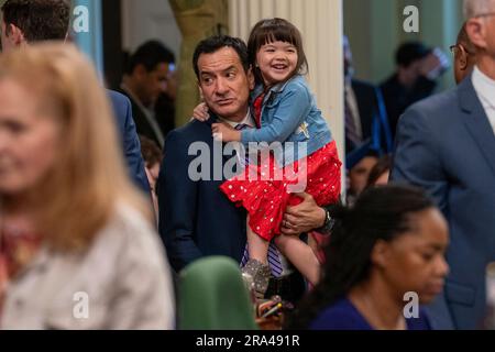 Former Assembly Speaker Anthony Rendon, D-Lakewood, holds his daughter,  Vienna, at the swearing-in ceremony for Assemblyman Robert Rivas,  D-Hollister, as the 71st Speaker of the California Assembly at the Capitol  in Sacramento