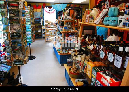 A souvenir store and gift shop in Vermont sells mugs and jugs of pure maple syrup Stock Photo