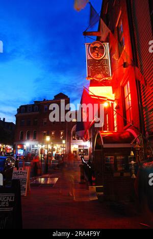 Cafes and taverns are alive and illuminated  at night in Portland, Maine Stock Photo