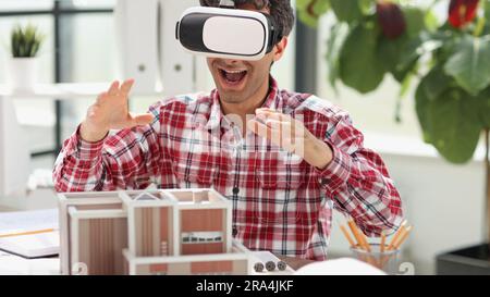 Architecture design drawings, building model on blueprint floor plan, house construction. 3d Stock Photo
