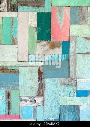 multicolor effective wood texture pattern background consists of several pieces of old wood of various sizes and colors, vertical style. Old wooden pl Stock Photo