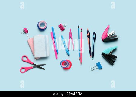 Composition with stationery supplies on blue background Stock Photo