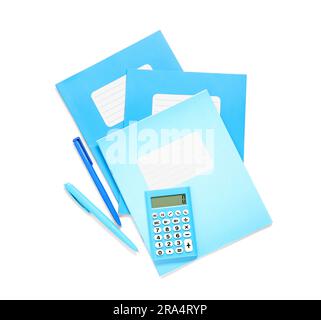 Different notebooks with pens and calculator isolated on white background Stock Photo