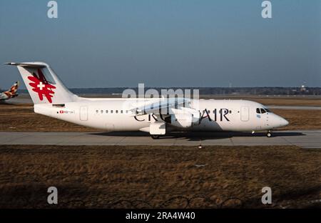 A British Aerospace BAe 146, RJ100 passenger jet, belonging to the Swiss Airline, Crossair, in 1998. Registration HB-IXT. Stock Photo