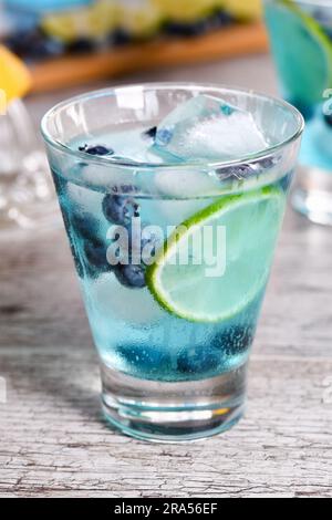 Blue Mojito with blueberries. Cocktails Liquor-based Blue Curacao Stock Photo